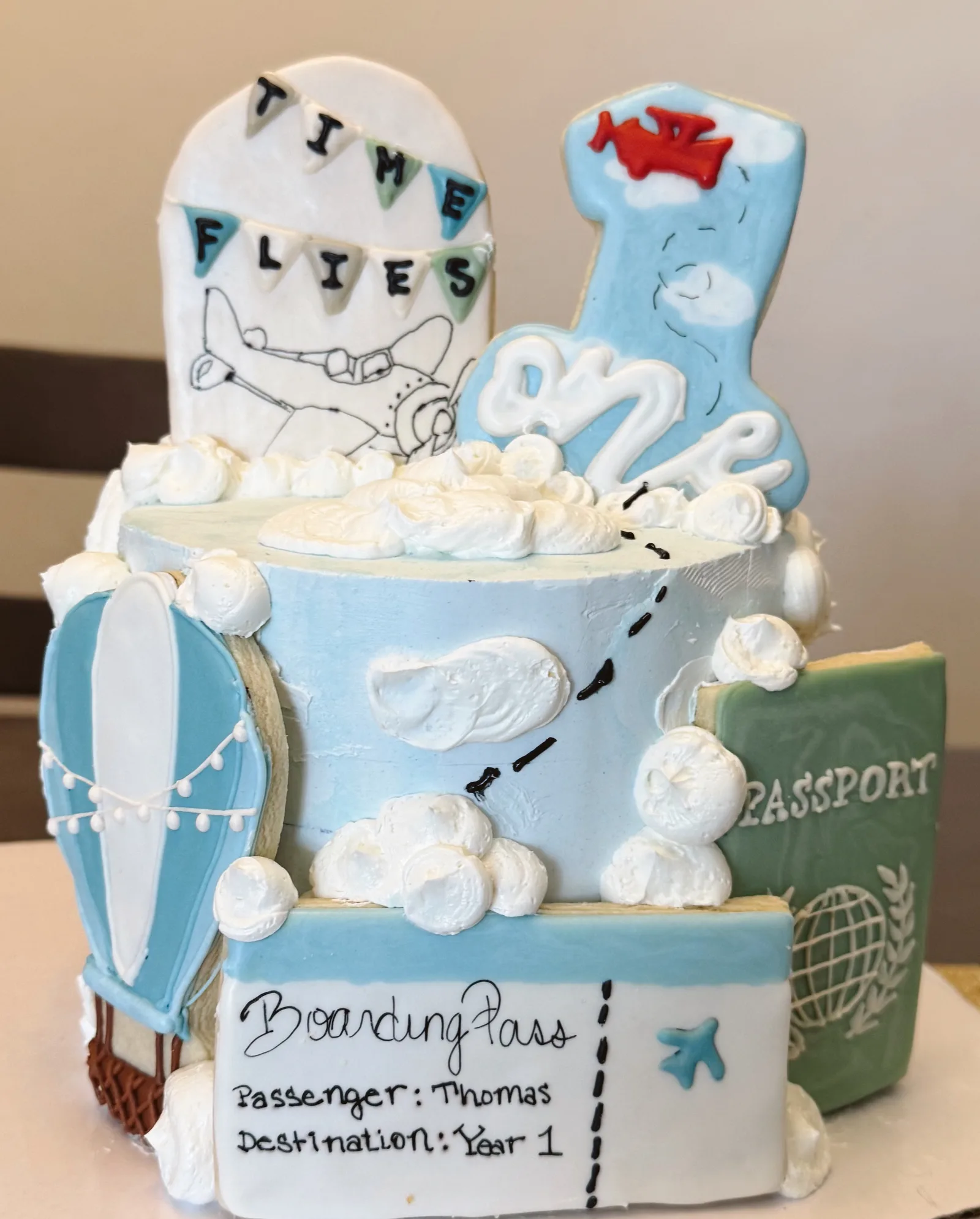 Time flies — first birthday travel theme